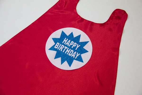 RED HAPPY BIRTHDAY CAPE - WITH WHITE & SPARKLE BLUE BURST