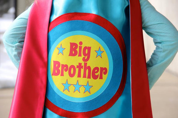 BIG BROTHER CAPE - TURQUOISE/RED
